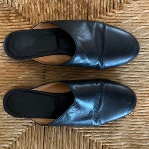 black leather slides by Martiniano